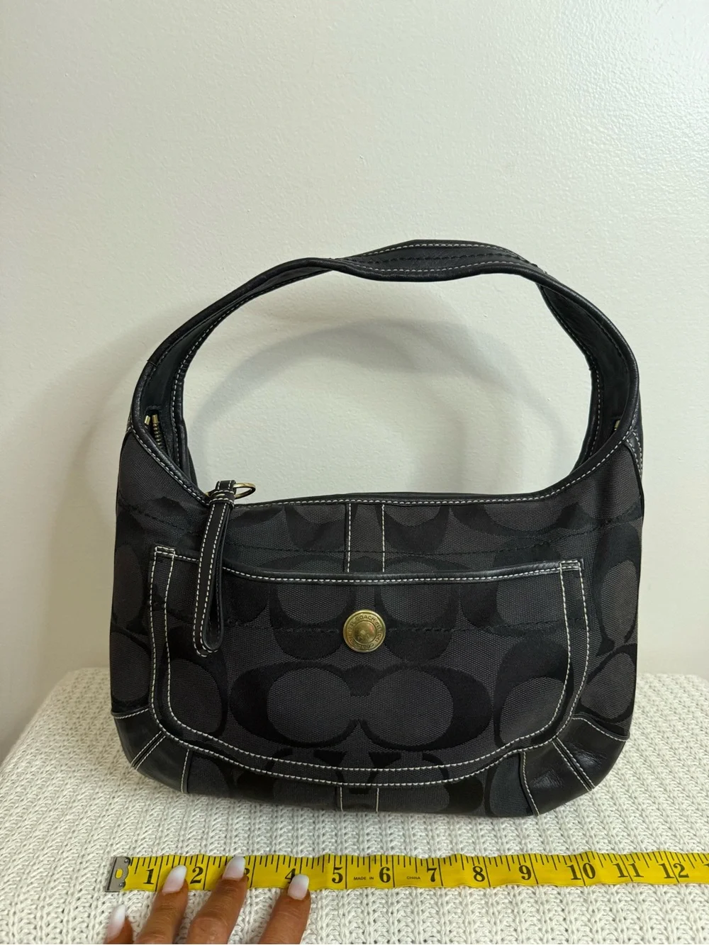 Coach Ergo Signature Jacquard Hobo bag featuring a black-on-black